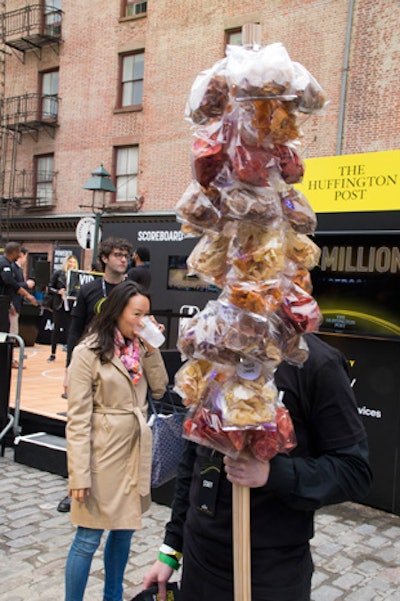 Servers roamed the city blocks, handing out flavored chips, popcorn, and soft pretzels.