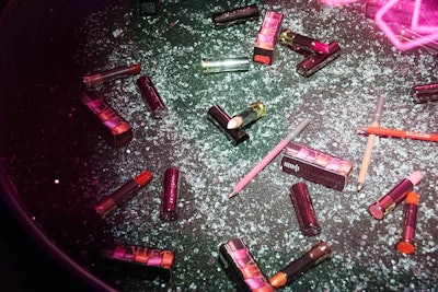 The lipstick collection served as decor and was on display in clear, round coffee tables.