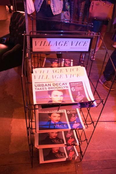 A newspaper rack held Urban Decay's branded riff on the Village Voice, with stories promoting the new makeup collection and star, actress Ruby Rose.
