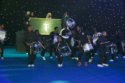 A drum corps and horn players from the Brooklyn United Marching Band played during the transition from cocktails to dinner.