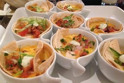 Design Cuisine Caterers served a mix of savory and sweet brunch foods at the annual Garden Brunch on Saturday afternoon hosted by Tammy Haddad, Sally and Mark Ein, BizBash's David Adler, and others. Breakfast items included chilaquiles breakfast mugs of tortilla, pulled chicken, refried beans, monterey jack cheese, salsa, and sliced jalapeño.