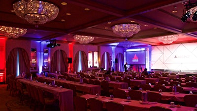 Creative lighting design and audiovisual production for corporate meeting.