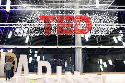 Michael Murphy created a hanging installation of the TED logo at last year’s annual conference in Vancouver with neoprene balls, monofilament, and steel mesh.