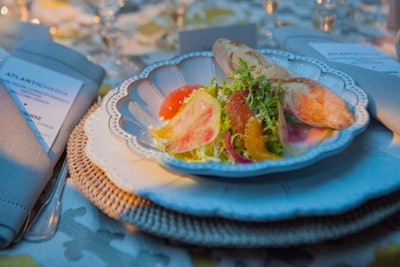 Susan Gage Caterers prepared a watermelon radish and citrus salad as the first course for the Atlantic Media Welcome Dinner on Friday night at the home of C.E.O. David Bradley. The menu also included seared sea bass with a bell pepper coulis, ginger basmati rice with pistachios, and julienne snow peas.