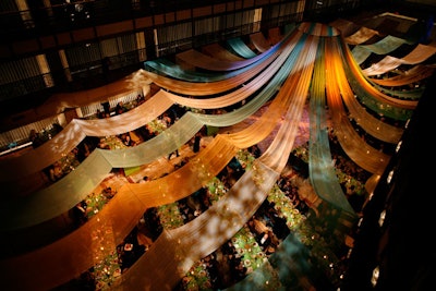 The New York City Opera's spring gala in 2008 celebrated the opening night of King Arthur. At the event, long strips of multicolored drapery served as a tent over the promenade of the New York State Theater.