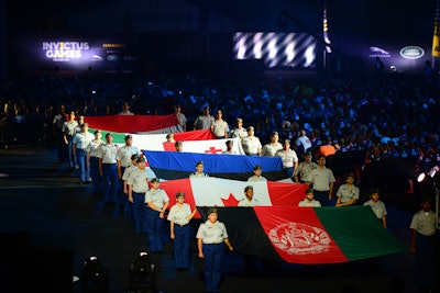 During the Parade of Nations, athletes from the participating countries marched around the stadium to music from the U.S. Army band.