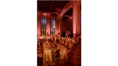 The flower arrangements at Rebeca and Sidney’s wedding reception were by Parrish Design.