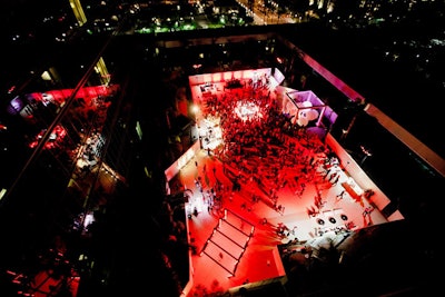 Red light bathed the crowd at YouTube’s official after-party following VidCon’s opening night.
