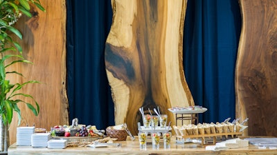 The wooden slabs make a perfect backdrop for a business meeting or social-event buffet.