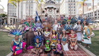 Mexi’cayotl Indio Cultural Center dancers posed for photos after a performance.