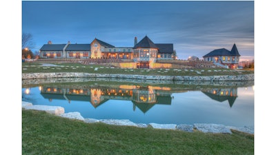 Mistwood Golf Club's clubhouse and pro shop from the third-hole greens