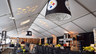 Custom-printed Opera chandeliers with the Steelers logo for the annual fashion show.