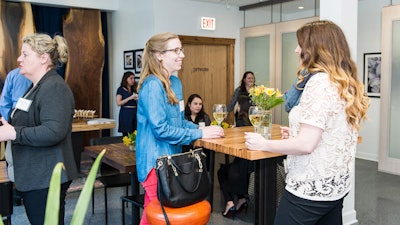 Guests enjoying themselves at a networking event.