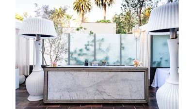 A modern marble bar area at the Huntley Hotel.