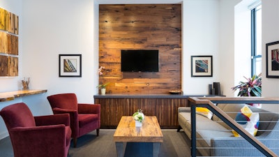 This cozy seating area includes: large flat-screen TV, Apple TV, and a Blu-ray player.