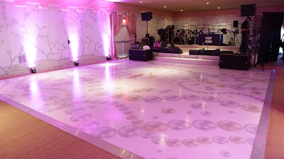 The outdoors was transformed into indoors with custom-designed and -built walls and a dance floor.