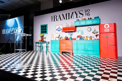 The backdrop to the Rammys award stage featured retro kitchen decor that gave the guests a glimpse into the supper dance's theme.