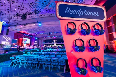 Headphone stations dotted the event space, providing guests an opportunity to listen to industry stories on the video screens above the dance floor. The sponsor lounges for Events DC, OpenTable, and Washington DC Economic Partnership also had headphones on the side tables and ottomans.