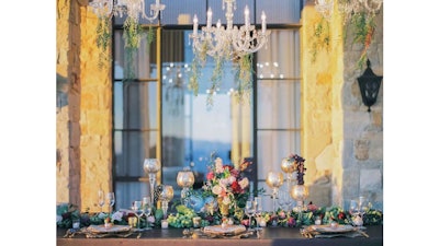 A gorgeous table and chandeliers at the Malibu Rocky Oaks Estate.