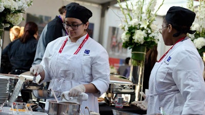 Preparing the breakfast buffet at the 2015 Chicago Marathon.