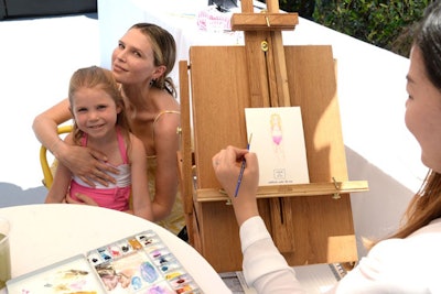 Kids could sit for watercolor paintings—an elegant spin on other styles of event portraiture—at an artist station at the event.