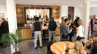 The bar is a highlight of the room and always a popular spot for guests.