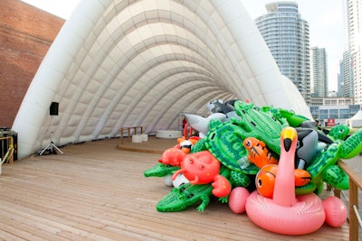 Partygoers found pleasure in an installation provided by architects Coryn Kempster and Julia Jamrozik called 'Inflatable Culture.' Composed entirely of beach paraphernalia, the piece brought attendees back to their childhood and encouraged them to grab a floatation toy of their choice to take around the event with them.