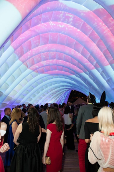 One of the evening's most notable spaces was an illuminated bubble tent in the outdoor area. Created by technical sponsor Westbury National, the area projected guests' lips and changed colors throughout the evening.