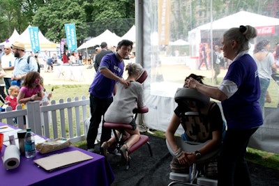The Aetna tent offered guests free wellness activities such as massages.