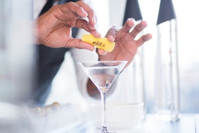 At all of the parties in the penthouse, bartenders used branded fruit peels to garnish cocktails.