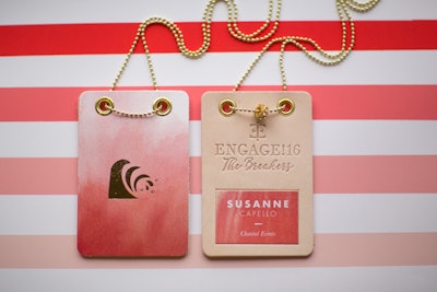 Vanessa Kreckel of Two Paper Dolls designed the leather name tags, which featured a charm for each year the guest had attended an Engage! summit.