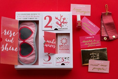 The event's branding was introduced in a countdown advent-style, two-part mailer. First, guests received a pop-up invitation and schedule of events, then a box filled with Engage! branded accessories, such as a sleep mask, luggage tag, and sunscreen. Gifts for the Good Life also created turn-down gifts for each evening of the event, which were themed to complement the activities the following day, such as a spa kit with a towel and robe and a travel set.