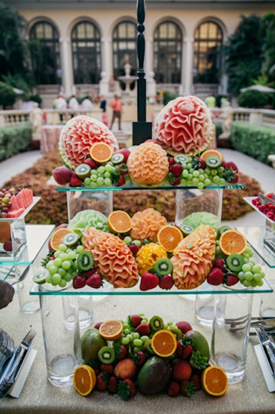 Ornate fruit carvings served as colorful decor during the morning meal.