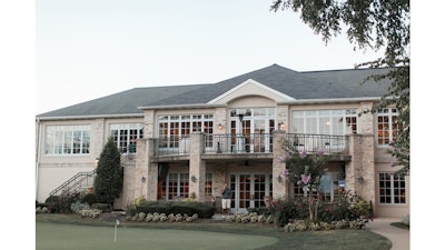 Manor Country Club clubhouse and putting green