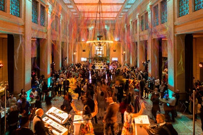 Revelers at the Suddenly Spring event got moving on the dance floor and mingled in multiple beautiful spaces set up within the hall.