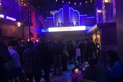 The Mafia III exhibit was perhaps the show floor's most elaborate. It was arranged like a vibrant street scene, with details built out both within the exhibit and on its exterior. Inside the exhibit was a cinema complete with marquee and neon.