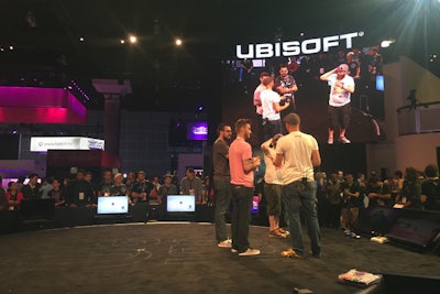 Ubisoft's exhibit included a theater in the round, surrounded by screens that supplied attendees with front-facing views of the action no matter where they stood.