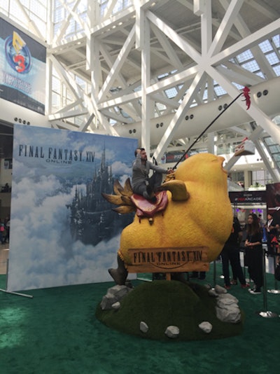 Just adjacent, Final Fantasy XIV set up another photo op, complete with enormous “Fat Chocobo” statue that attendees lined up to climb on.