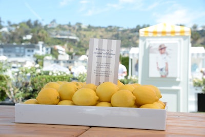 Lemon yellow was not just the color palette: the citrus fruit served as pops of color in bowls and other vessels throughout the event's decor.