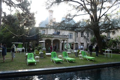 Green logo towels topped chaise lounges.