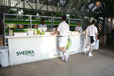 At the event, waiters dressed up as pool boys served drinks and ensured that eventgoers—so-called 'club members'—had everything they needed, from pool towels draped over lawn chairs to Svedka Cucumber Lime cocktails. Staff wore striped tube socks to their knees and shirts bearing the event's crest.