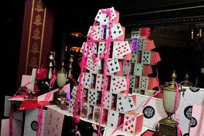 Sean Daly created a precarious-looking house of cards decor piece, decorated with trailing ribbon.