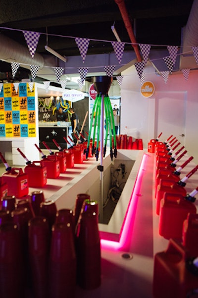 Brightly colored Jerry cans were used as decorations throughout the event space.