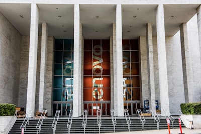 Giant, vinyl logos covered the front windows of the venue from floor to ceiling.