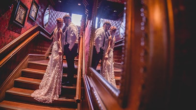 A couple in the stairwell on their wedding day