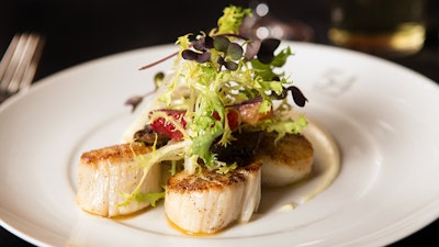 Pan-seared sea scallops with shiitake mushrooms, parsnip puree, and citrus