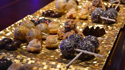 Platters of housemade petit fours: cake pops, tarts, and artisanal chocolates