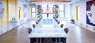 Penthouse loft set up for 36 guests in boardroom style.