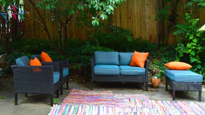 Handwoven braided rugs and rich textiles gave a homey feel to the outdoors.