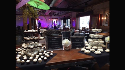 Second-floor wedding reception with band and dessert station.